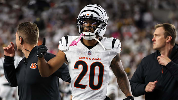 Oct 16, 2025; Cincinnati, Ohio, USA; Cincinnati Bengals cornerback DJ Turner II (20) gestures toward his bench as he walks off the field with an apparent injury against the Pittsburgh Steelers during the third quarter at Paycor Stadium. Mandatory Credit: Joseph Maiorana-Imagn Images