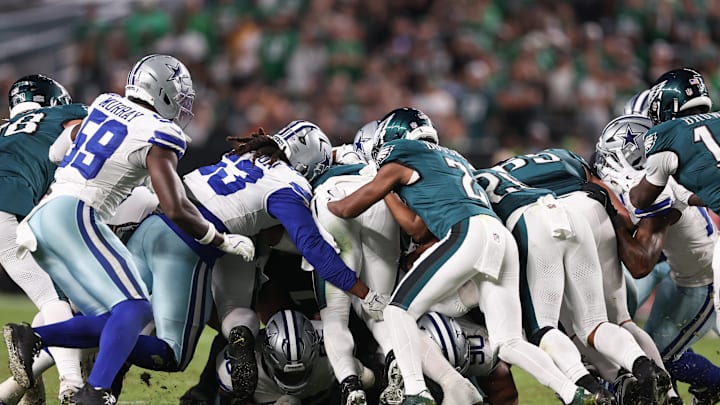 Somewhere in the mass of players is Jalen Hurts after running the tush push, a play th Bears can look forward to seeing on Sunday.