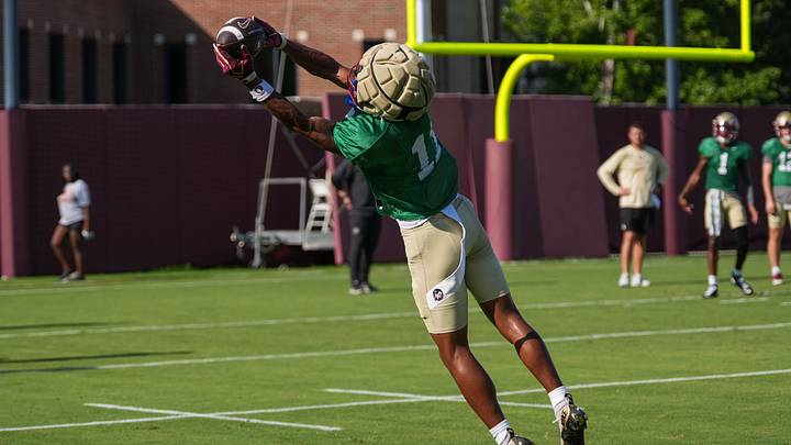 The Florida State Seminole Devin Carter (11) puts in work on the field with the first home game just a few weeks away, Thursday, Aug. 13, 2026.