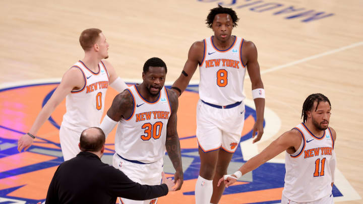 Jan 18, 2024; New York, New York, USA; New York Knicks head coach Tom Thibodeau high fives New York Knicks forward Julius Randle (30) with guard Donte DiVincenzo (0) and forward OG Anunoby (8) and guard Jalen Brunson (11) during the first quarter against the Washington Wizards at Madison Square Garden. Mandatory Credit: Brad Penner-USA TODAY Sports