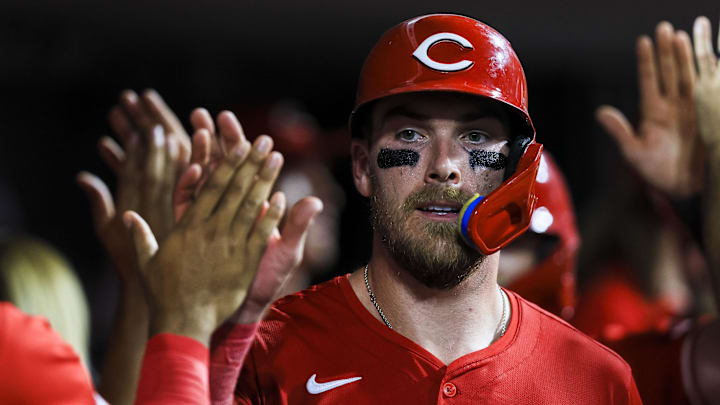 Jul 30, 2025; Cincinnati, Ohio, USA; Cincinnati Reds catcher Tyler Stephenson (37) high fives teammates after scoring on a two-run triple hit by first baseman Spencer Steer (not pictured) in the eighth inning against the Los Angeles Dodgers at Great American Ball Park. Mandatory Credit: Katie Stratman-Imagn Images