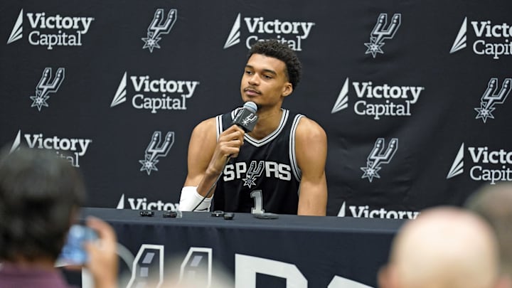 Sep 30, 2024; San Antonio, TX, USA; San Antonio Spurs center Victor Wembanyama (1) answers questions from the media during Media day at Victory Capital Performance Center in San Antonio. Mandatory Credit: Scott Wachter-Imagn Images Sep 30, 2024; San Antonio, TX, USA; San Antonio Spurs center Victor Wembanyama (1) answers questions from the media during Media day at Victory Capital Performance Center in San Antonio. Mandatory Credit: Scott Wachter-Imagn Images