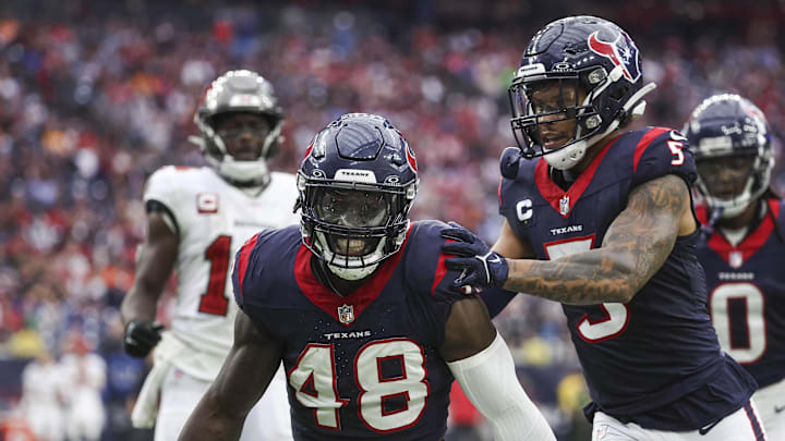 Nov 5, 2023; Houston, Texas, USA; Houston Texans linebacker Christian Harris (48) and safety Jalen Pitre (5) react after a defensive play at NRG Stadium. Mandatory Credit: Troy Taormina-Imagn Images