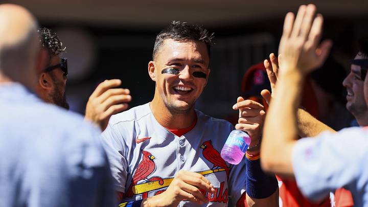 Aug 31, 2025; Cincinnati, Ohio, USA; St. Louis Cardinals outfielder Lars Nootbaar (21) high fives teammates after scoring on a sacrifice fly out hit by designated hitter Ivan Herrera (not pictured) in the third inning against the Cincinnati Reds at Great American Ball Park. Mandatory Credit: Katie Stratman-Imagn Images