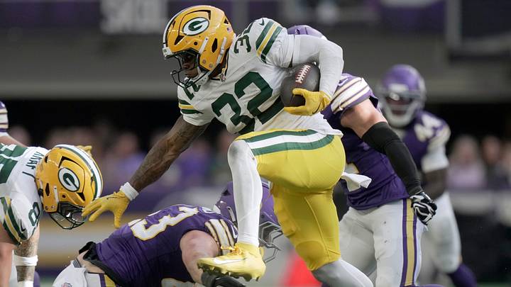 Green Bay Packers running back Marshawn Lloyd (32) runs the ball during the third quarter of their game Sunday, Sept. 13, 2026 at U.S. Bank Stadium in Minneapolis, Minnesota. The Minnesota Vikings beat the Green Bay Packers 39-22.