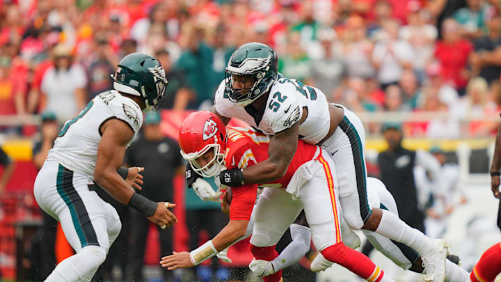 Sep 14, 2025; Kansas City, Missouri, USA; Philadelphia Eagles defensive end Za'Darius Smith (52) sacks Kansas City Chiefs quarterback Patrick Mahomes (15) during the second quarter of the game at GEHA Field at Arrowhead Stadium. Mandatory Credit: Jay Biggerstaff-Imagn Images