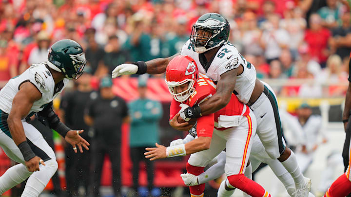 Sep 14, 2025; Kansas City, Missouri, USA; Philadelphia Eagles defensive end Za'Darius Smith (52) sacks Kansas City Chiefs quarterback Patrick Mahomes (15) during the second quarter of the game at GEHA Field at Arrowhead Stadium. Mandatory Credit: Jay Biggerstaff-Imagn Images