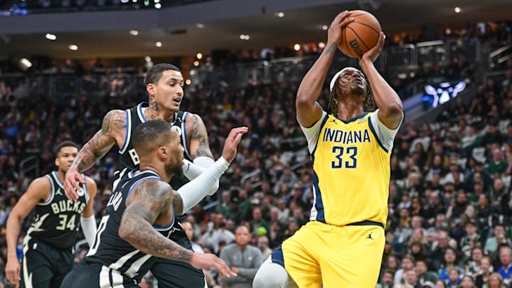 Apr 27, 2025; Milwaukee, Wisconsin, USA: Indiana Pacers center Myles Turner (33) takes a shot against Milwaukee Bucks guard Damian Lillard (0) and forward Kyle Kuzma (18) in the first quarter during game four of first round for the 2024 NBA Playoffs at Fiserv Forum. Mandatory Credit: Benny Sieu-Imagn Images Apr 27, 2025; Milwaukee, Wisconsin, USA: Indiana Pacers center Myles Turner (33) takes a shot against Milwaukee Bucks guard Damian Lillard (0) and forward Kyle Kuzma (18) in the first quarter during game four of first round for the 2024 NBA Playoffs at Fiserv Forum. Mandatory Credit: Benny Sieu-Imagn Images