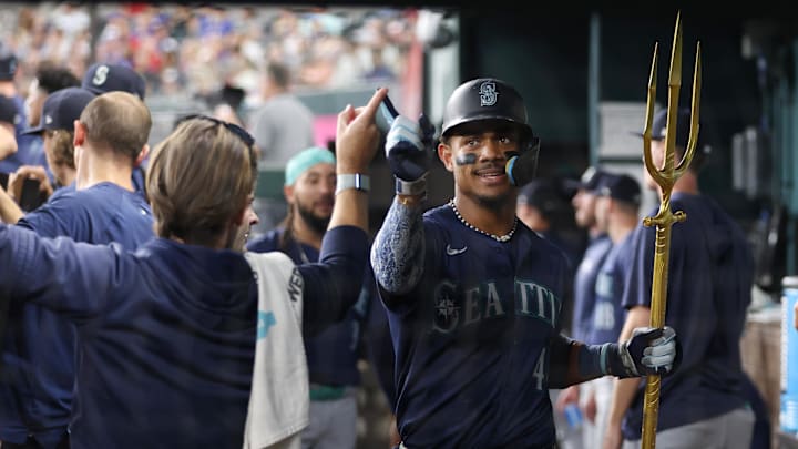 Seattle Mariners center fielder Julio Rodriguez (44) is congratulated after hitting a two-run home run against the Texas Rangers in the seventh inning at Globe Life Field on Sept 20. Seattle Mariners center fielder Julio Rodriguez (44) is congratulated after hitting a two-run home run against the Texas Rangers in the seventh inning at Globe Life Field on Sept 20.