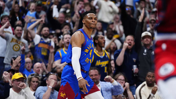 May 3, 2025; Denver, Colorado, USA; Denver Nuggets guard Russell Westbrook (4) reacts after a three point score in the second quarter against the LA Clippers during game seven of first round for the 2025 NBA Playoffs at Ball Arena. Mandatory Credit: Ron Chenoy-Imagn Images