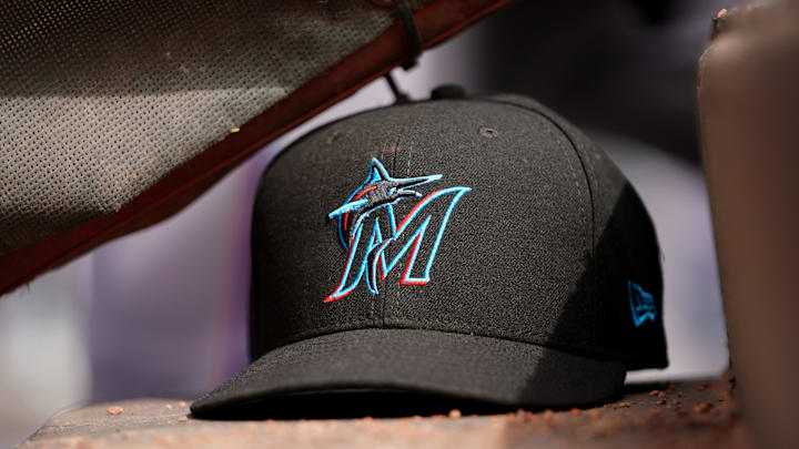 Apr 11, 2019; Cincinnati, OH, USA; A view of a New Era Miami Marlins hat in the dugout during the game against the Cincinnati Reds at Great American Ball Park. Mandatory Credit: Aaron Doster-Imagn Images