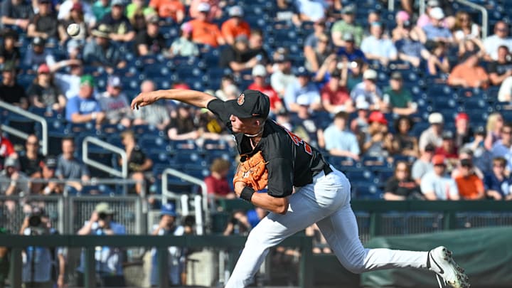 Jun 13, 2025; Omaha, Neb, USA; Oregon State Beavers starting pitcher Dax Whitney (30) throws against the Louisville Cardinals during the first inning at Charles Schwab Field. Mandatory Credit: Steven Branscombe-Imagn Images