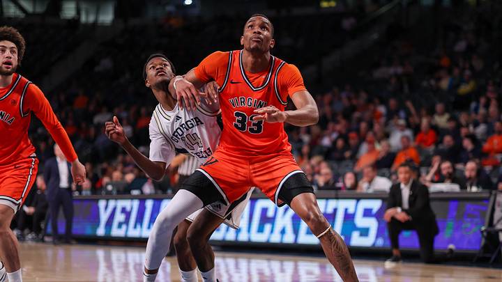 Feb 18, 2026; Atlanta, Georgia, USA; Virginia Cavaliers center Ugonna Onyenso (33) boxes out Georgia Tech Yellow Jackets forward Kowacie Reeves Jr. (14) in the second half at McCamish Pavilion. Mandatory Credit: Brett Davis-Imagn Images Feb 18, 2026; Atlanta, Georgia, USA; Virginia Cavaliers center Ugonna Onyenso (33) boxes out Georgia Tech Yellow Jackets forward Kowacie Reeves Jr. (14) in the second half at McCamish Pavilion. Mandatory Credit: Brett Davis-Imagn Images