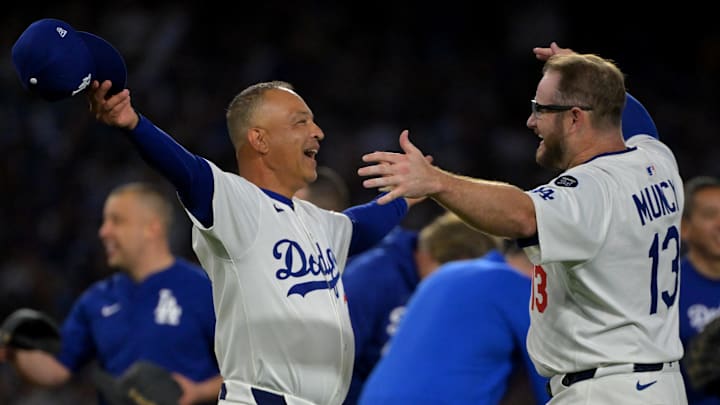 Oct 9, 2025; Los Angeles, California, USA; Los Angeles Dodgers manager Dave Roberts (30) and Los Angeles Dodgers third baseman Max Muncy (13) celebrate after defeating the Philadelphia Phillies in game four of the NLDS round for the 2025 MLB playoffs at Dodger Stadium. Mandatory Credit: Jayne Kamin-Oncea-Imagn Images Oct 9, 2025; Los Angeles, California, USA; Los Angeles Dodgers manager Dave Roberts (30) and Los Angeles Dodgers third baseman Max Muncy (13) celebrate after defeating the Philadelphia Phillies in game four of the NLDS round for the 2025 MLB playoffs at Dodger Stadium. Mandatory Credit: Jayne Kamin-Oncea-Imagn Images