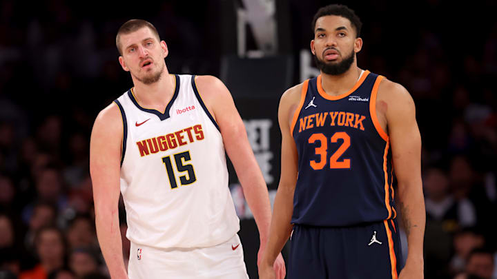 Jan 29, 2025; New York, New York, USA; Denver Nuggets center Nikola Jokic (15) and New York Knicks center Karl-Anthony Towns (32) react during the fourth quarter at Madison Square Garden. Mandatory Credit: Brad Penner-Imagn Images