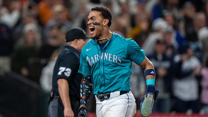 Seattle Mariners centerfielder Julio Rodriguez (44) celebrates after scoring a run against the Oakland Athletics at T-Mobile Park in 2024. Seattle Mariners centerfielder Julio Rodriguez (44) celebrates after scoring a run against the Oakland Athletics at T-Mobile Park in 2024.