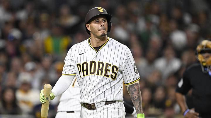 May 23, 2026; San Diego, California, USA; San Diego Padres third baseman Manny Machado (13) walks back to the dugout after striking out during the fifth inning against the Athletics at Petco Park. Mandatory Credit: Denis Poroy-Imagn Images