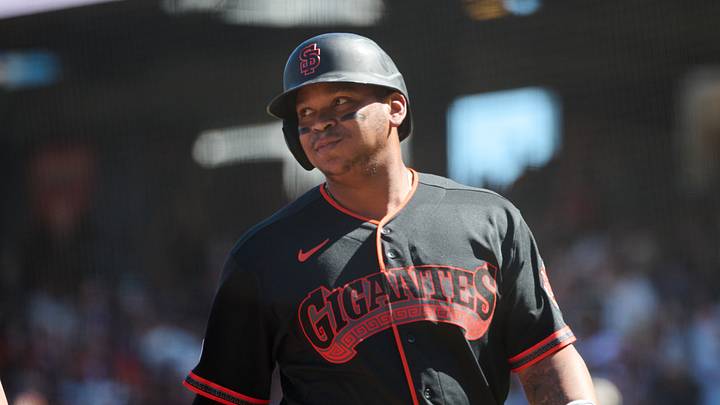 San Francisco, California, USA; San Francisco Giants infielder Rafael Devers (16) reacts after scoring a run on an RBI single hit by outfielder Jung Hoo Lee (not pictured) against the Arizona Diamondbacks during the eighth inning at Oracle Park. Mandatory Credit: Robert Edwards-Imagn Images