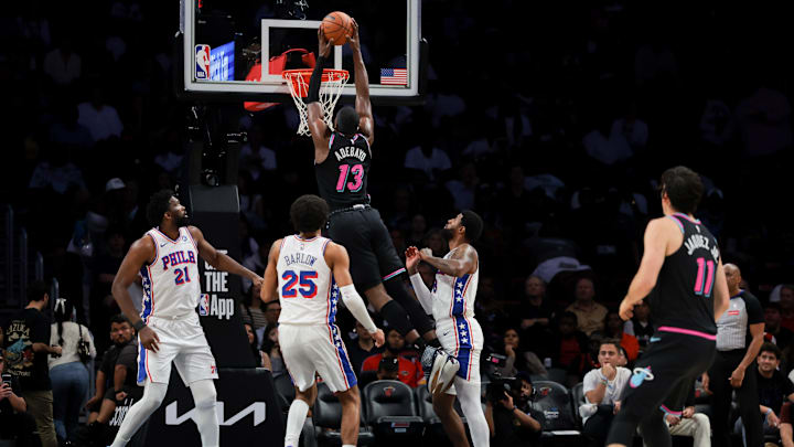 Mar 30, 2026; Miami, Florida, USA; Miami Heat center Bam Adebayo (13) dunks against the Philadelphia 76ers during the third quarter at Kaseya Center. Mandatory Credit: Sam Navarro-Imagn Images