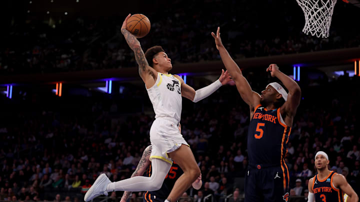 Jan 30, 2024; New York, New York, USA; Utah Jazz guard Keyonte George (3) dunks against New York Knicks forward Precious Achiuwa (5) during the fourth quarter at Madison Square Garden. Mandatory Credit: Brad Penner-Imagn Images