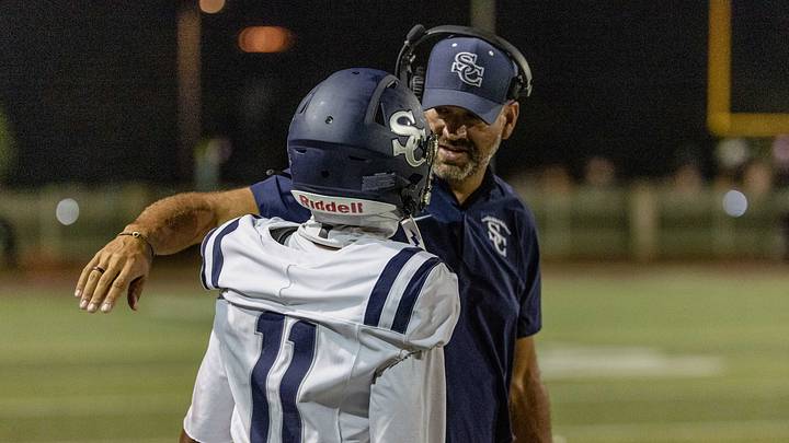 Sierra Canyon football coach Jon Ellinghouse talks to a player in the middle of game amid the 2026 season. Sierra Canyon football coach Jon Ellinghouse talks to a player in the middle of game amid the 2026 season.