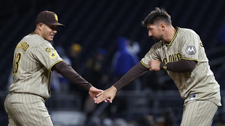 Apr 6, 2026; Pittsburgh, Pennsylvania, USA;  San Diego Padres third baseman Manny Machado (13) and designated hitter Nick Castellanos (right) celebrate after defeating the Pittsburgh Pirates at PNC Park. Mandatory Credit: Charles LeClaire-Imagn Images