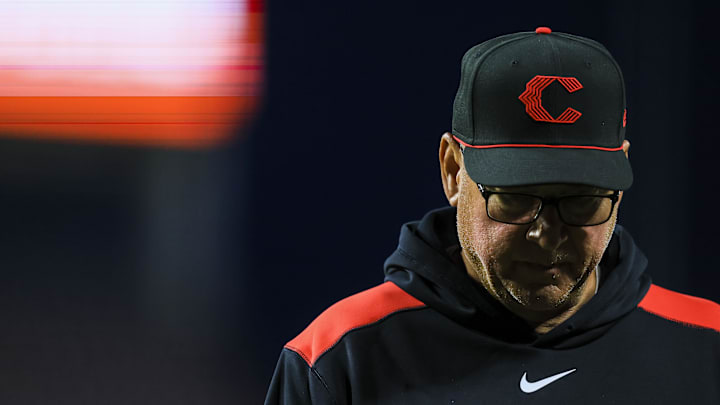 May 2, 2025; Cincinnati, Ohio, USA; Cincinnati Reds manager Terry Francona (77) walks off the field during a stop in play in the third inning against the Washington Nationals at Great American Ball Park. Mandatory Credit: Katie Stratman-Imagn Images