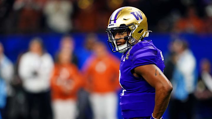 Jan 1, 2024; New Orleans, LA, USA; Washington Huskies quarterback Michael Penix Jr. (9) looks on