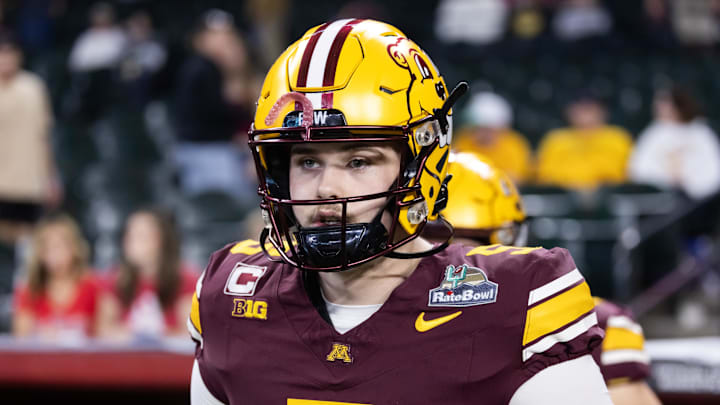 Dec 26, 2025; Phoenix, AZ, USA; Minnesota Golden Gophers quarterback Drake Lindsey (5) against the New Mexico Lobos during the Rate Bowl at Chase Field. Mandatory Credit: Mark J. Rebilas-Imagn Images