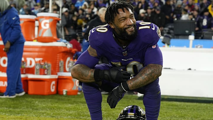 Dec 10, 2023; Baltimore, Maryland, USA;  Baltimore Ravens cornerback Arthur Maulet (10) celebrates after winning in overtime against the Los Angeles Rams at M&T Bank Stadium. Mandatory Credit: Jessica Rapfogel-Imagn Images