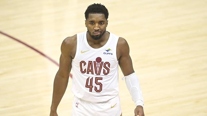 Nov 27, 2024; Cleveland, Ohio, USA; Cleveland Cavaliers guard Donovan Mitchell (45) reacts in the fourth quarter against the Atlanta Hawks at Rocket Mortgage FieldHouse. Mandatory Credit: David Richard-Imagn Images