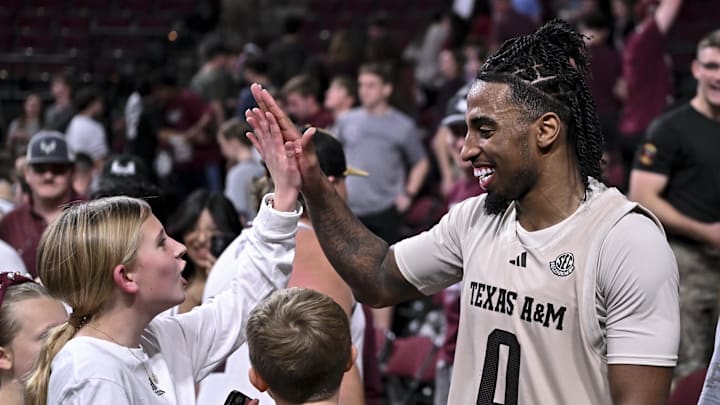 Feb 18, 2026; College Station, Texas, USA; Texas A&M Aggies guard Marcus Hill (0) high fives a fan after the game against the Ole Miss Rebels at Reed Arena. Mandatory Credit: Maria Lysaker-Imagn Images Feb 18, 2026; College Station, Texas, USA; Texas A&M Aggies guard Marcus Hill (0) high fives a fan after the game against the Ole Miss Rebels at Reed Arena. Mandatory Credit: Maria Lysaker-Imagn Images