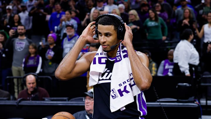 Mar 17, 2025; Sacramento, California, USA; Sacramento Kings forward Keegan Murray (13) is interviewed by media after the game against the Memphis Grizzlies at Golden 1 Center. Mandatory Credit: Sergio Estrada-Imagn Images