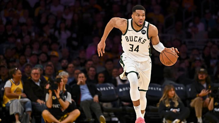 Mar 20, 2025; Los Angeles, California, USA; Milwaukee Bucks forward Giannis Antetokounmpo (34) moves the ball against the Los Angeles Lakers during the first half at Crypto.com Arena. Mandatory Credit: Jonathan Hui-Imagn Images