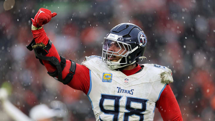 Tennessee Titans defensive tackle Jeffery Simmons (98) reacts after sacking Cleveland Browns quarterback Shedeur Sanders (not pictured) during the fourth quarter at Huntington Bank Field.