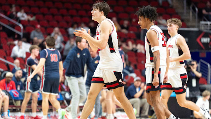 Cedar Falls’ Will Gerdes (32) reacts March 9, 2026 during an Iowa high school boys state basketball tournament quarterfinal against the Urbandale J-Hawks at the Casey’s Center in Des Moines, Iowa.