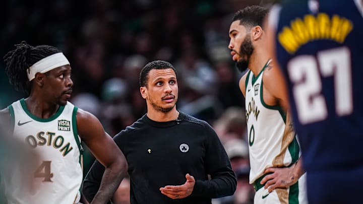 Jan 19, 2024; Boston, Massachusetts, USA; Boston Celtics head coach Joe Mazzulla talks with forward Jayson Tatum.
