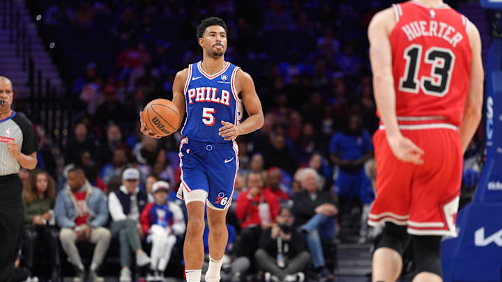 Apr 13, 2025; Philadelphia, Pennsylvania, USA; Philadelphia 76ers guard Quentin Grimes (5) controls the ball against the Chicago Bulls in the first quarter at Wells Fargo Center. Mandatory Credit: Kyle Ross-Imagn Images