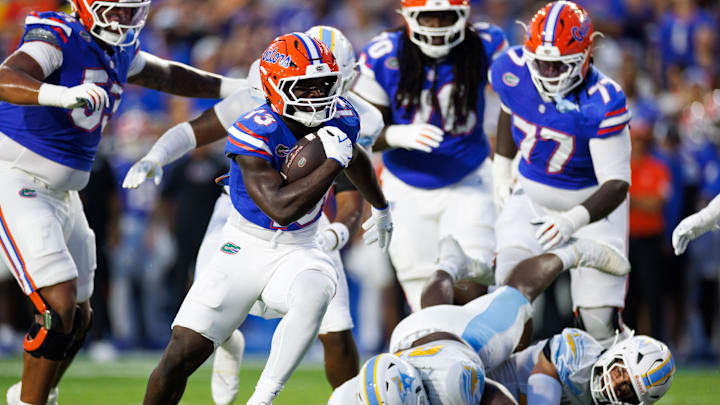 Aug 30, 2025; Gainesville, Florida, USA; Florida Gators running back Jadan Baugh (13) runs with the ball for a touchdown against the Long Island Sharks during the first half at Ben Hill Griffin Stadium. Mandatory Credit: Matt Pendleton-Imagn Images