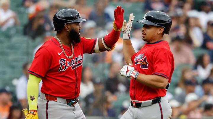 Sep 21, 2025; Detroit, Michigan, USA;  Atlanta Braves catcher Drake Baldwin (30) receives congratulations from designated hitter Marcell Ozuna (20) after scoring in the ninth inning against the Detroit Tigers at Comerica Park. Mandatory Credit: Rick Osentoski-Imagn Images
