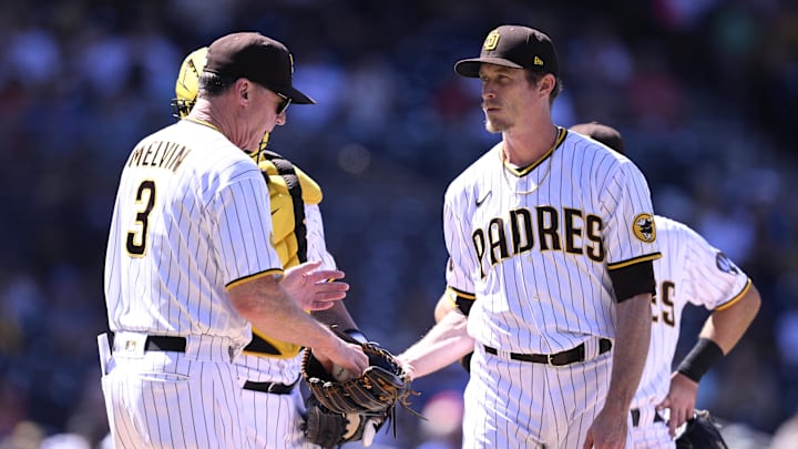 Sep 6, 2023; San Diego, California, USA; San Diego Padres manager Bob Melvin (3) takes the ball from relief pitcher Tim Hill (25) during the fifth inning against the Philadelphia Phillies at Petco Park. Mandatory Credit: Orlando Ramirez-Imagn Images Sep 6, 2023; San Diego, California, USA; San Diego Padres manager Bob Melvin (3) takes the ball from relief pitcher Tim Hill (25) during the fifth inning against the Philadelphia Phillies at Petco Park. Mandatory Credit: Orlando Ramirez-Imagn Images