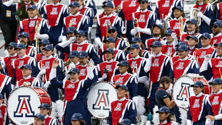 Nov 22, 2025; Tucson, Arizona, USA; Detailed view of the Arizona Wildcats marching band in the grandstands at Casino Del Sol Stadium. Mandatory Credit: Mark J. Rebilas-Imagn Images Nov 22, 2025; Tucson, Arizona, USA; Detailed view of the Arizona Wildcats marching band in the grandstands at Casino Del Sol Stadium. Mandatory Credit: Mark J. Rebilas-Imagn Images