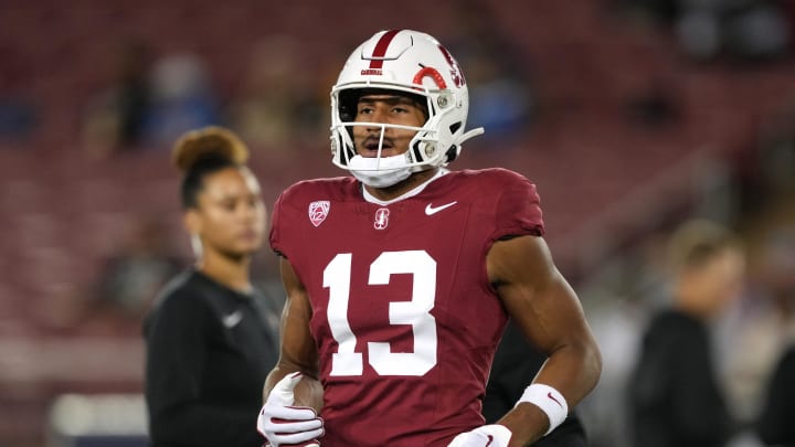 Oct 21, 2023; Stanford, California, USA; Stanford Cardinal wide receiver Elic Ayomanor (13) jogs on the field before the game against the UCLA Bruins at Stanford Stadium. Mandatory Credit: Darren Yamashita-USA TODAY Sports