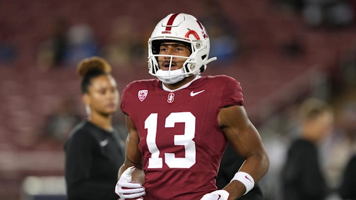 Oct 21, 2023; Stanford, California, USA; Stanford Cardinal wide receiver Elic Ayomanor (13) jogs on the field before the game against the UCLA Bruins at Stanford Stadium. Mandatory Credit: Darren Yamashita-Imagn Images