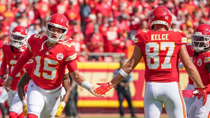Kansas City Chiefs quarterback Patrick Mahomes greets tight end Travis Kelce