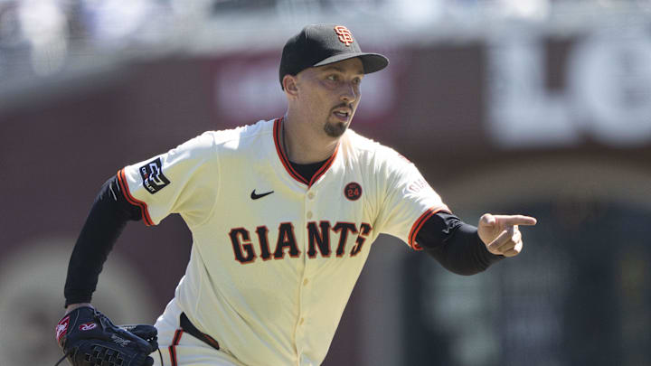 Sep 5, 2024; San Francisco, California, USA;  San Francisco Giants pitcher Blake Snell (7) signals to the catcher during the first inning against the Arizona Diamondbacks at Oracle Park. Mandatory Credit: Stan Szeto-Imagn Images