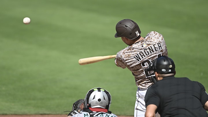 Sep 28, 2025; San Diego, California, USA; San Diego Padres third baseman Will Wagner (24) hits a single during the fifth inning against the Arizona Diamondbacks at Petco Park. 