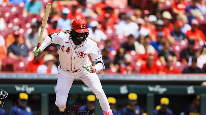 Jun 4, 2025; Cincinnati, Ohio, USA; Cincinnati Reds shortstop Elly De La Cruz (44) dodges a wild pitch in the first inning against the Milwaukee Brewers at Great American Ball Park. Mandatory Credit: Katie Stratman-Imagn Images