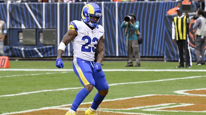 Sep 29, 2024; Chicago, Illinois, USA;  Los Angeles Rams running back Kyren Williams (23) celebrates after he scores a touchdown against the Chicago Bears during the second half at Soldier Field. Mandatory Credit: Matt Marton-Imagn Images