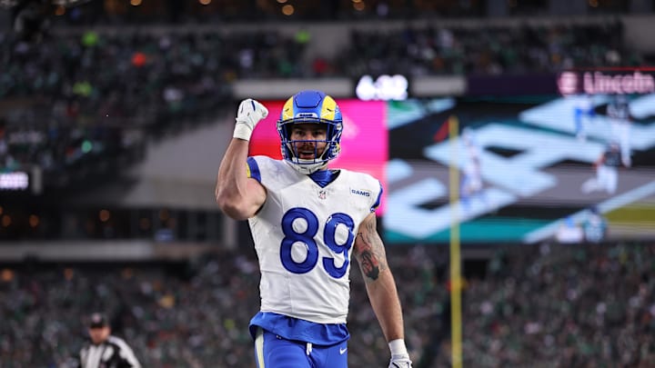 Jan 19, 2025; Philadelphia, Pennsylvania, USA; Los Angeles Rams tight end Tyler Higbee (89) celebrates after scoring a touchdown in the first quarter against the Philadelphia Eagles in a 2025 NFC divisional round game at Lincoln Financial Field. Mandatory Credit: Bill Streicher-Imagn Images